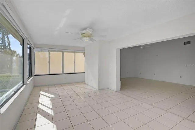 a view of an empty room and window