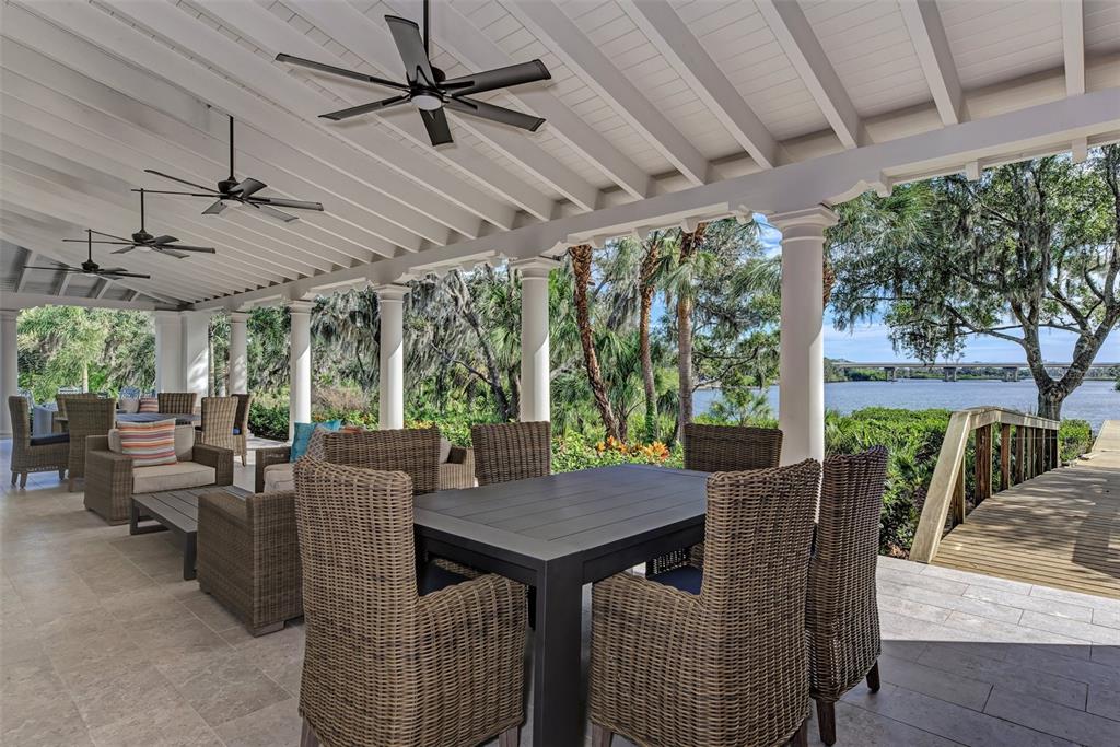 1810 Rio Vista Terrace Parrish, FL 34219 - Photo 10 of 14 a view of a patio with a table chairs and a patio