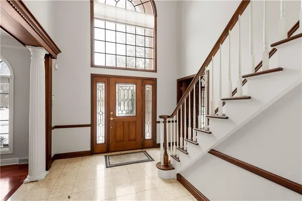 a view of an entryway with staircase