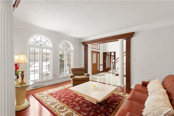 a living room with furniture and a table