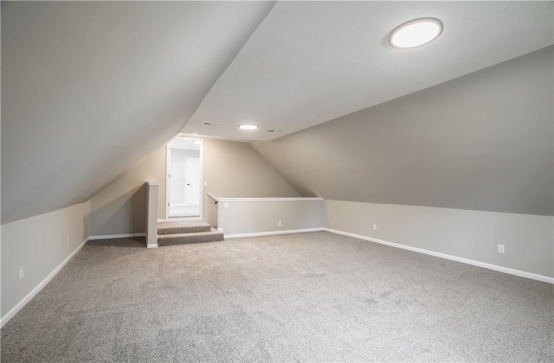 8240 Looney Road Piqua, OH 45356 - Photo 32 of 49 This spacious attic space offers endless possibilities for customization and comfort.