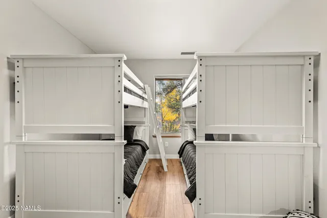 a view of a chairs and table in the balcony