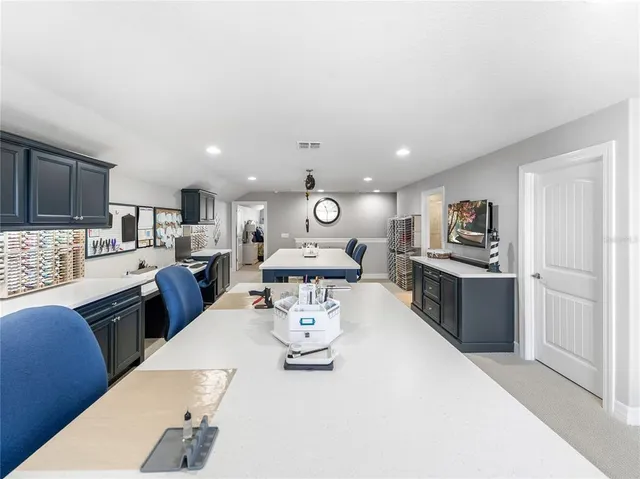 a view of a backyard with garden and patio