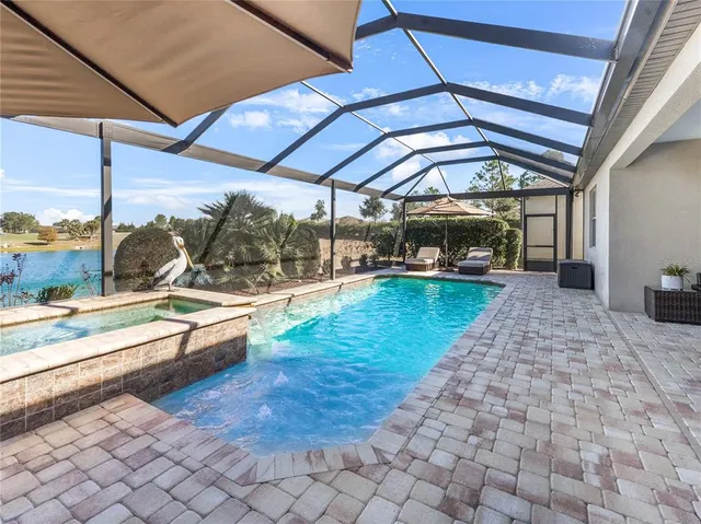 a view of a swimming pool and an ocean