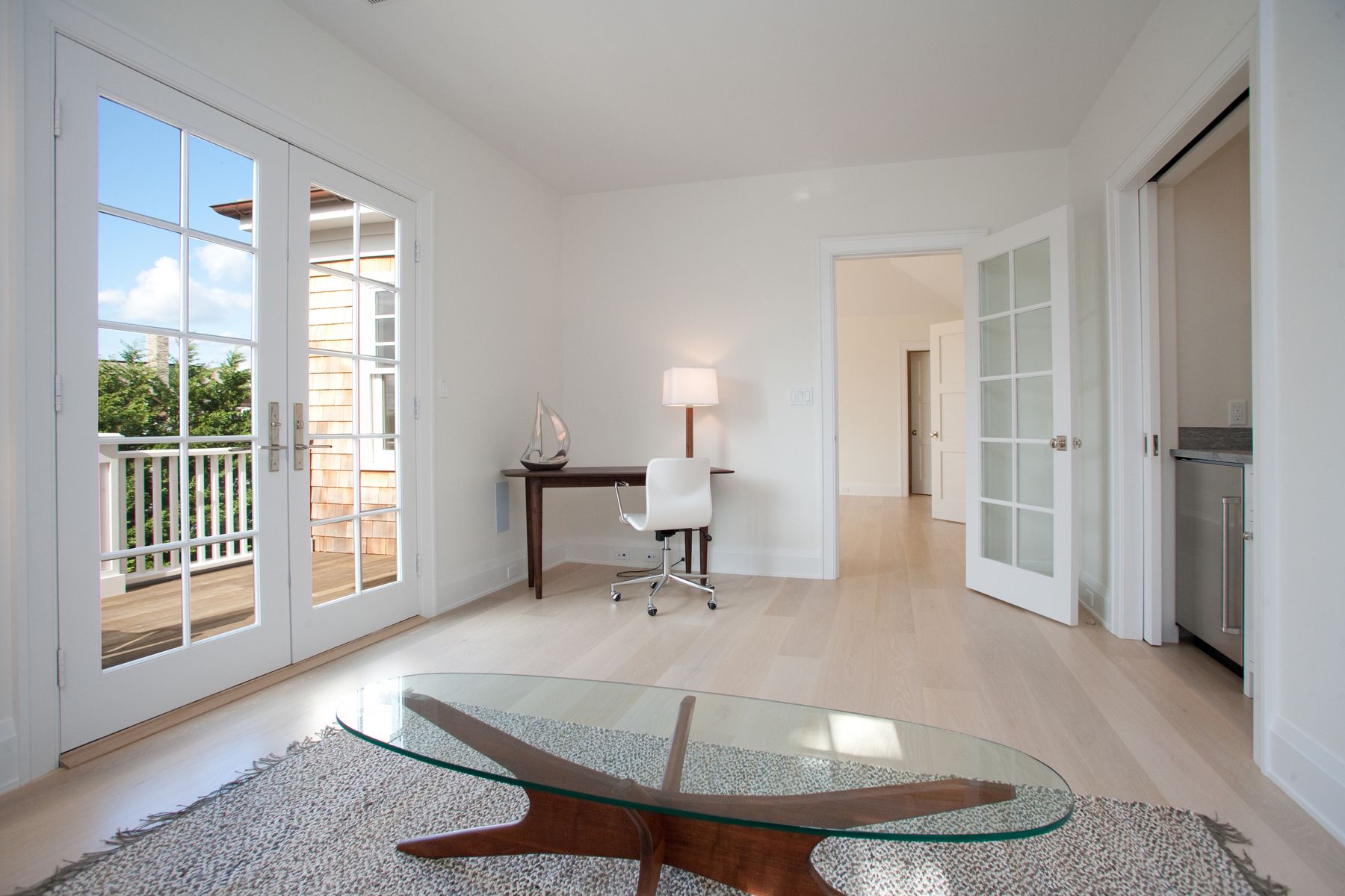 Undisclosed Address Water Mill, NY 11976 - Photo 11 of 16 a living room with furniture and a window