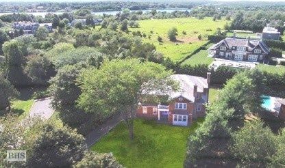 Undisclosed Address Water Mill, NY 11976 - Photo 14 of 16 a view of a city with a building in the background