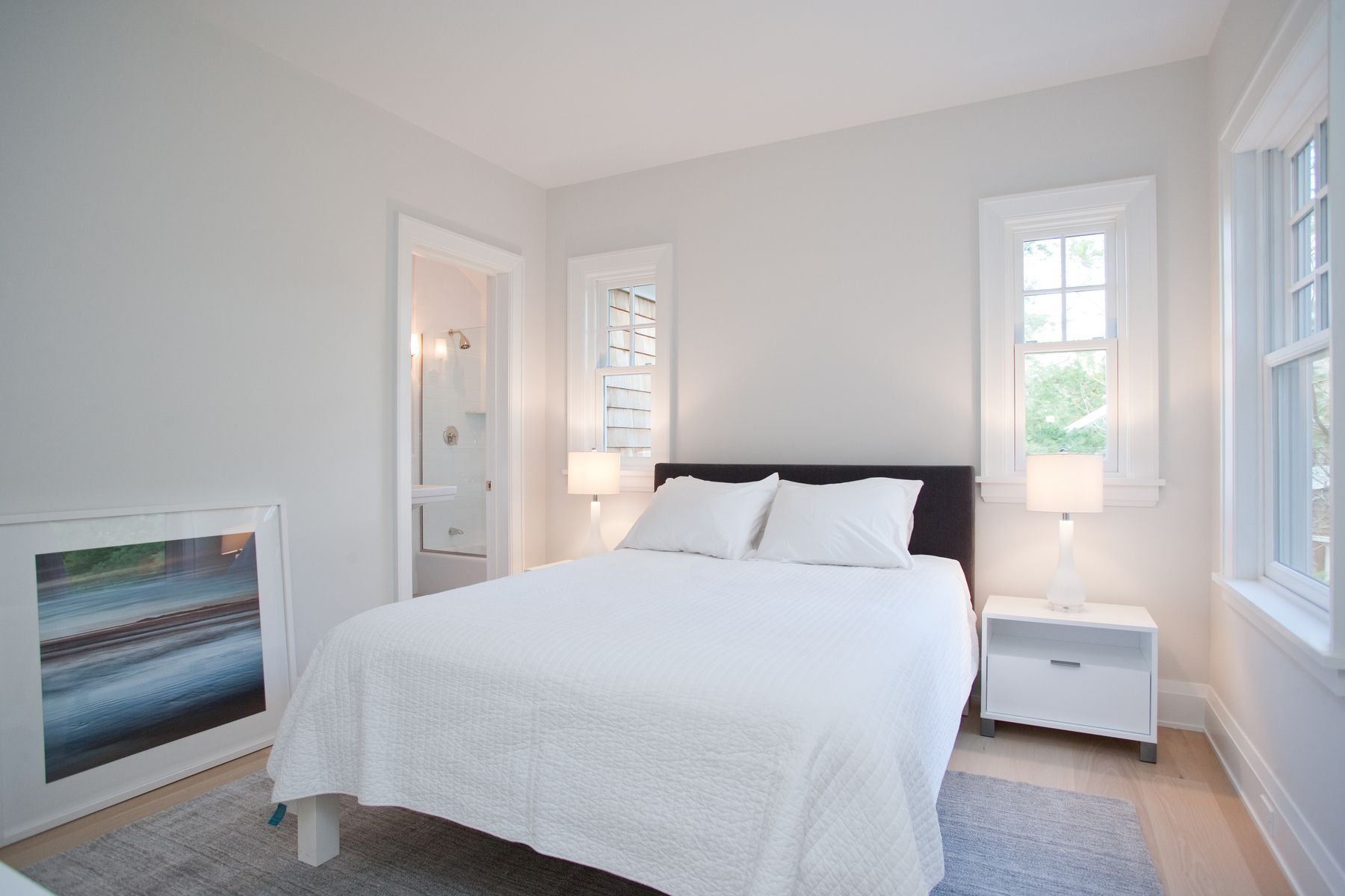 Undisclosed Address Water Mill, NY 11976 - Photo 9 of 16 a bedroom with a bed and a window