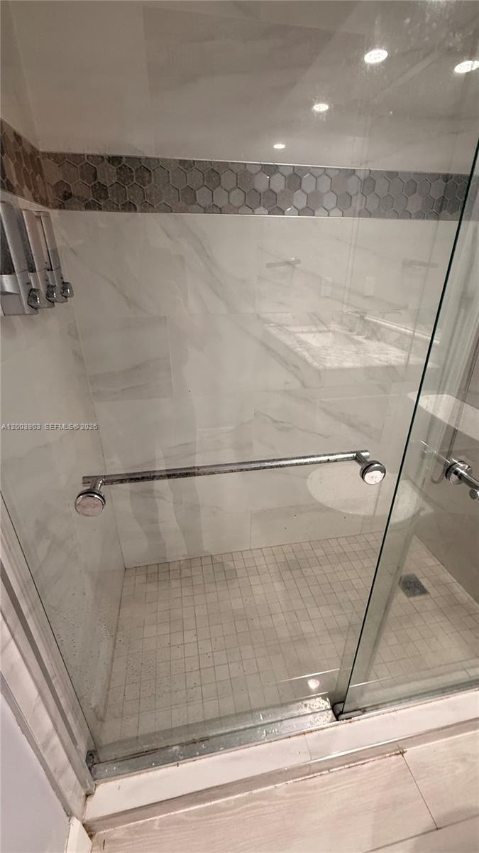821 Lyons Road, Unit 21102 Coconut Creek, FL 33063 - Photo 3 of 17 a view of a bathroom