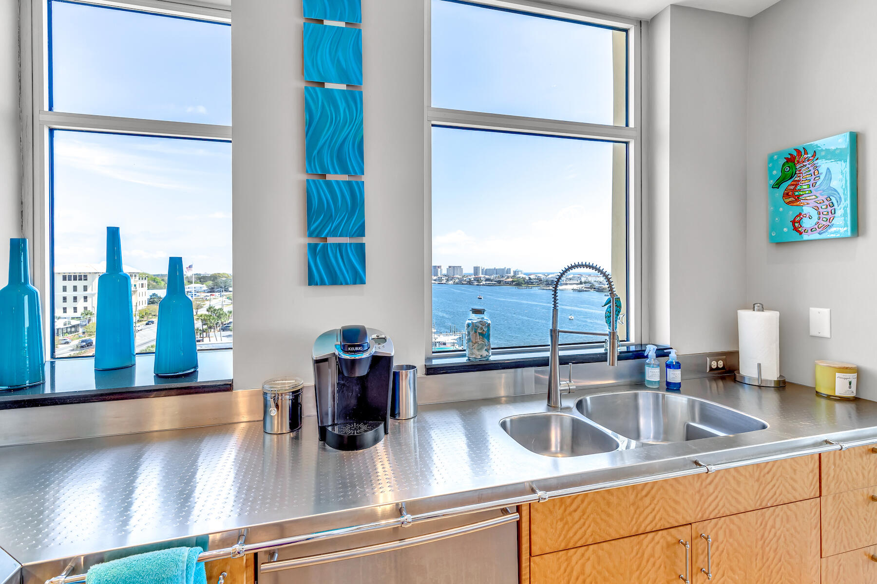 508 Harbor Boulevard, Unit 501 Destin, FL 32541 - Photo 14 of 47 a kitchen with a sink and a window