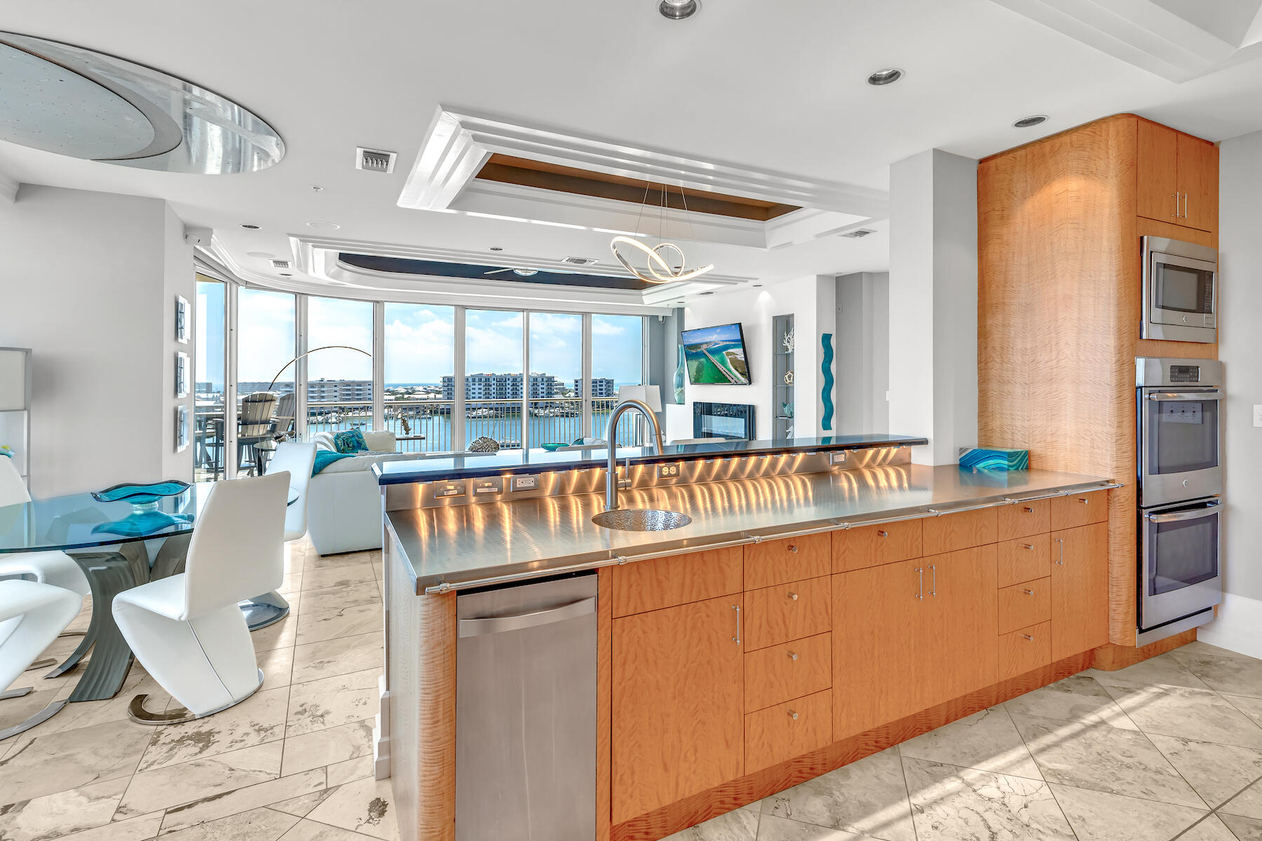 508 Harbor Boulevard, Unit 501 Destin, FL 32541 - Photo 15 of 47 a kitchen with stainless steel appliances granite countertop a sink and a counter space