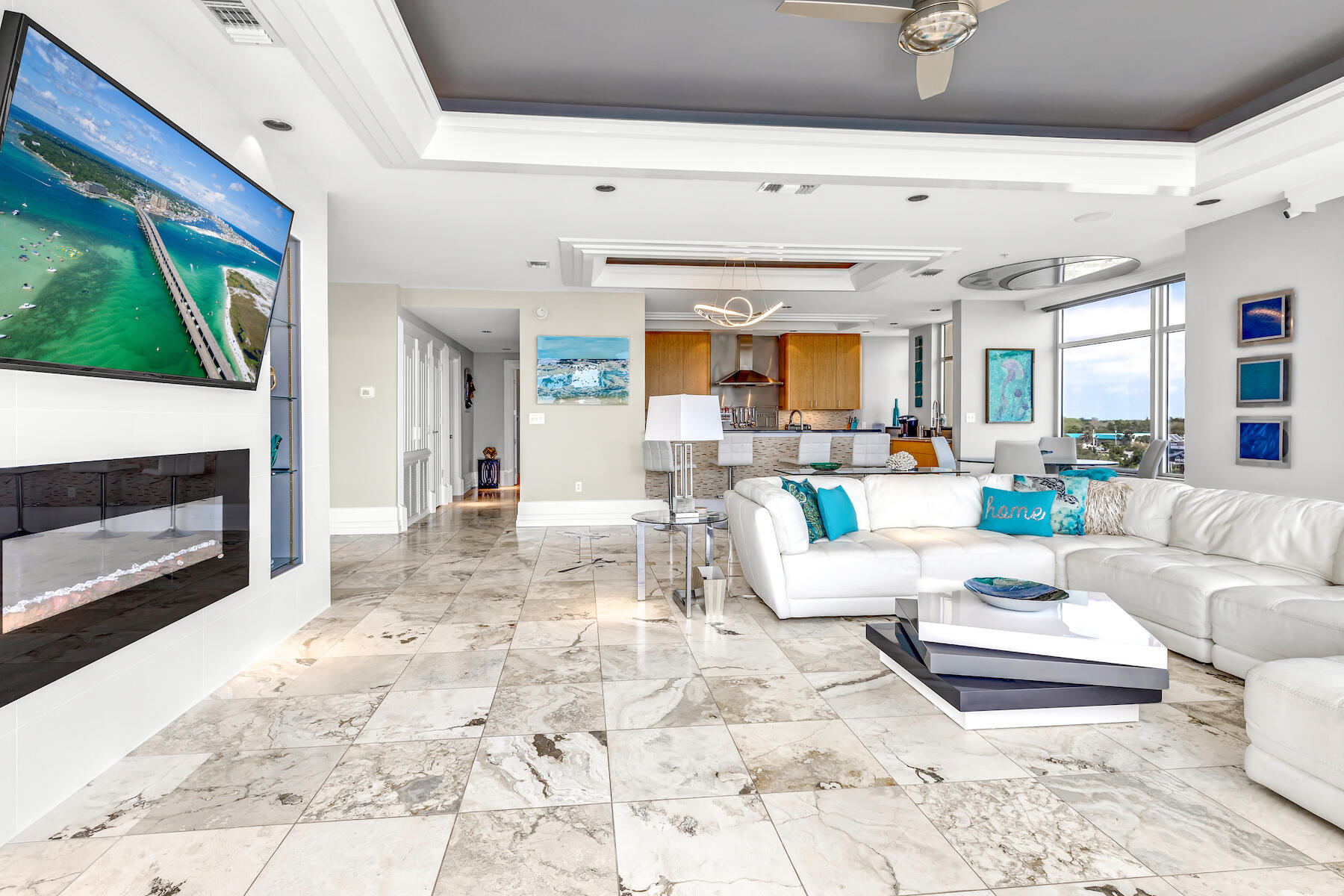 508 Harbor Boulevard, Unit 501 Destin, FL 32541 - Photo 17 of 47 a living room with furniture and a fireplace