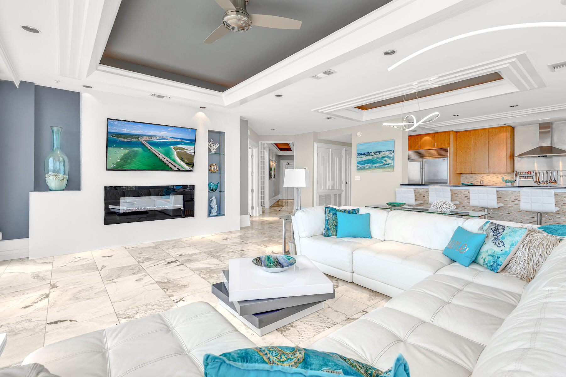 508 Harbor Boulevard, Unit 501 Destin, FL 32541 - Photo 19 of 47 a living room with furniture and a flat screen tv