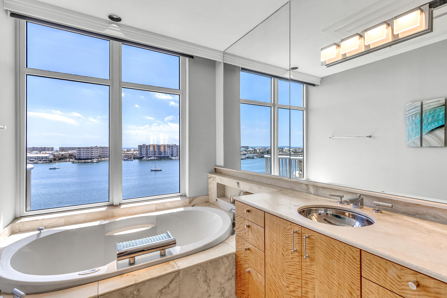 508 Harbor Boulevard, Unit 501 Destin, FL 32541 - Photo 22 of 47 a kitchen with a stove a sink and a cabinets