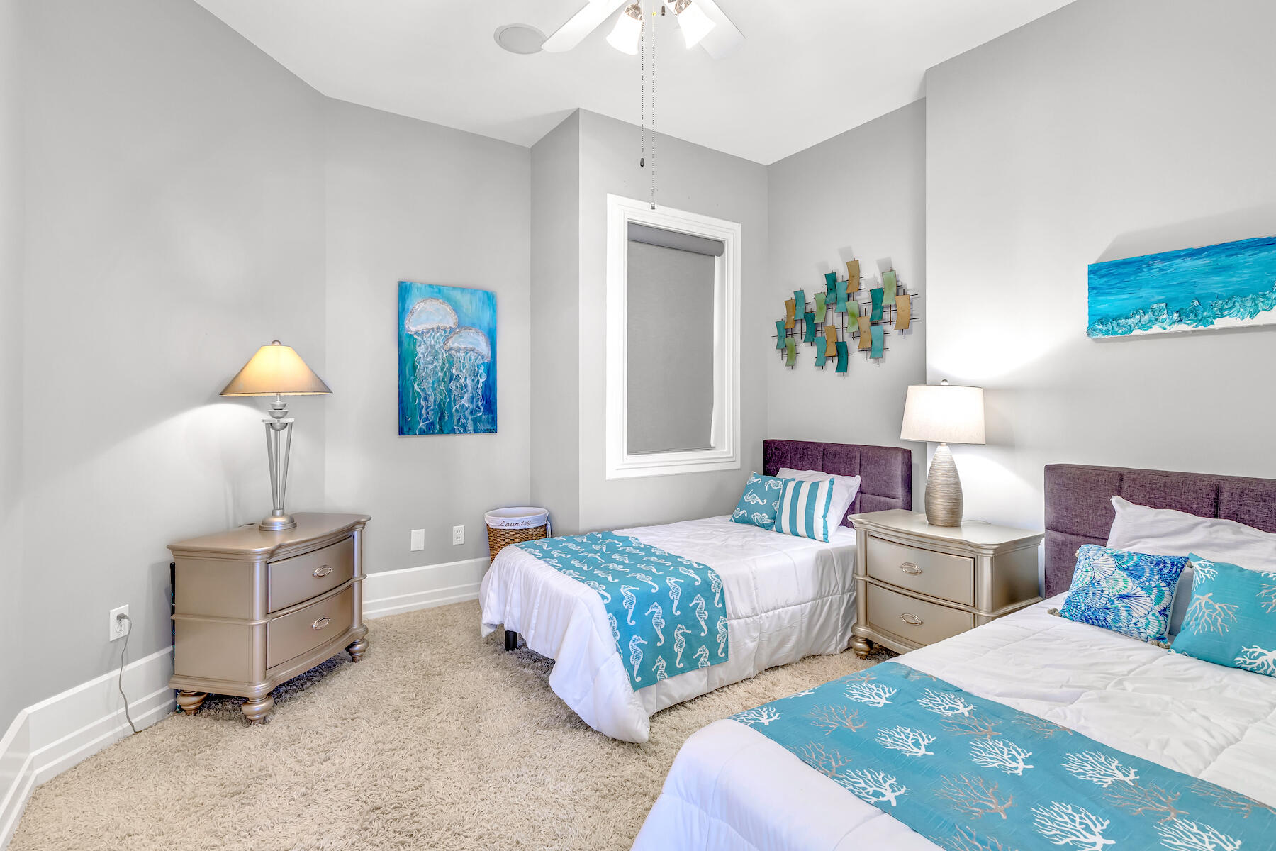 508 Harbor Boulevard, Unit 501 Destin, FL 32541 - Photo 23 of 47 a bedroom with two beds and painting on the wall