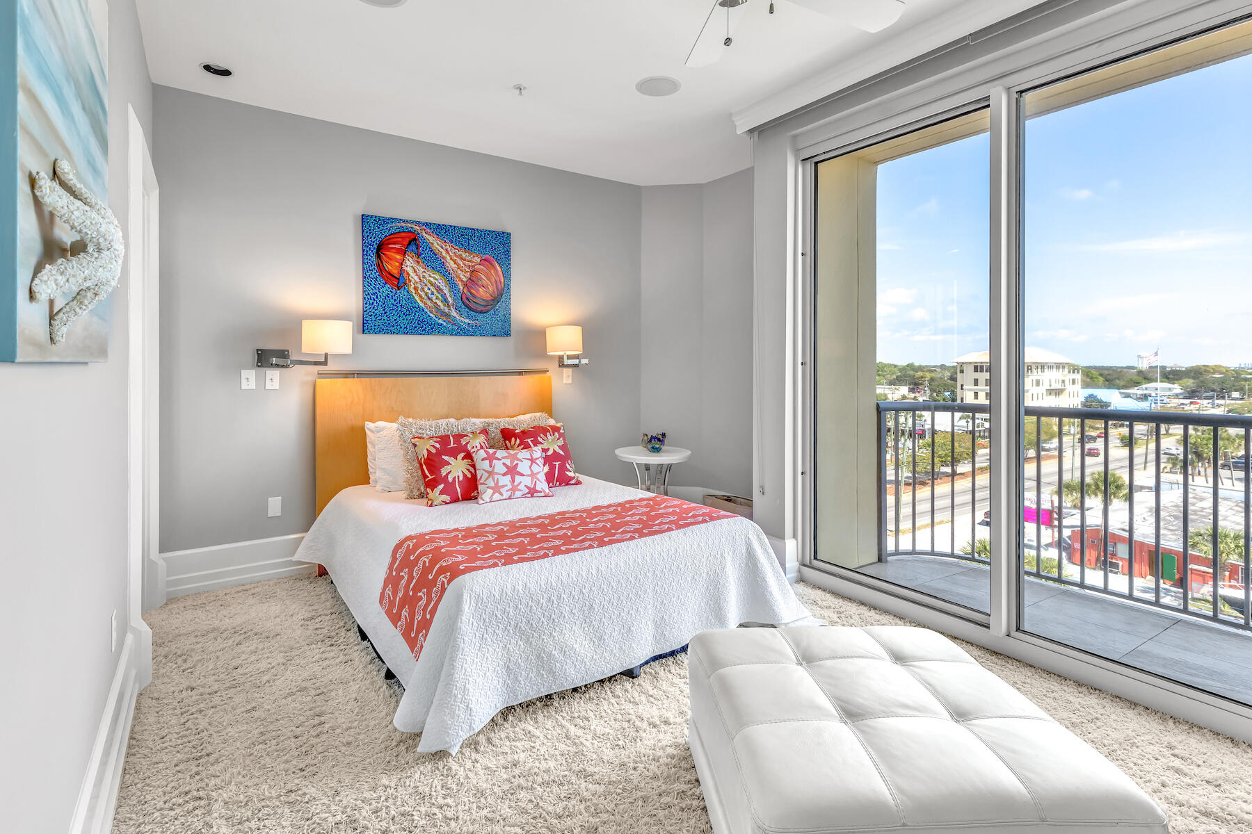 508 Harbor Boulevard, Unit 501 Destin, FL 32541 - Photo 24 of 47 a bedroom with a bed and a large window