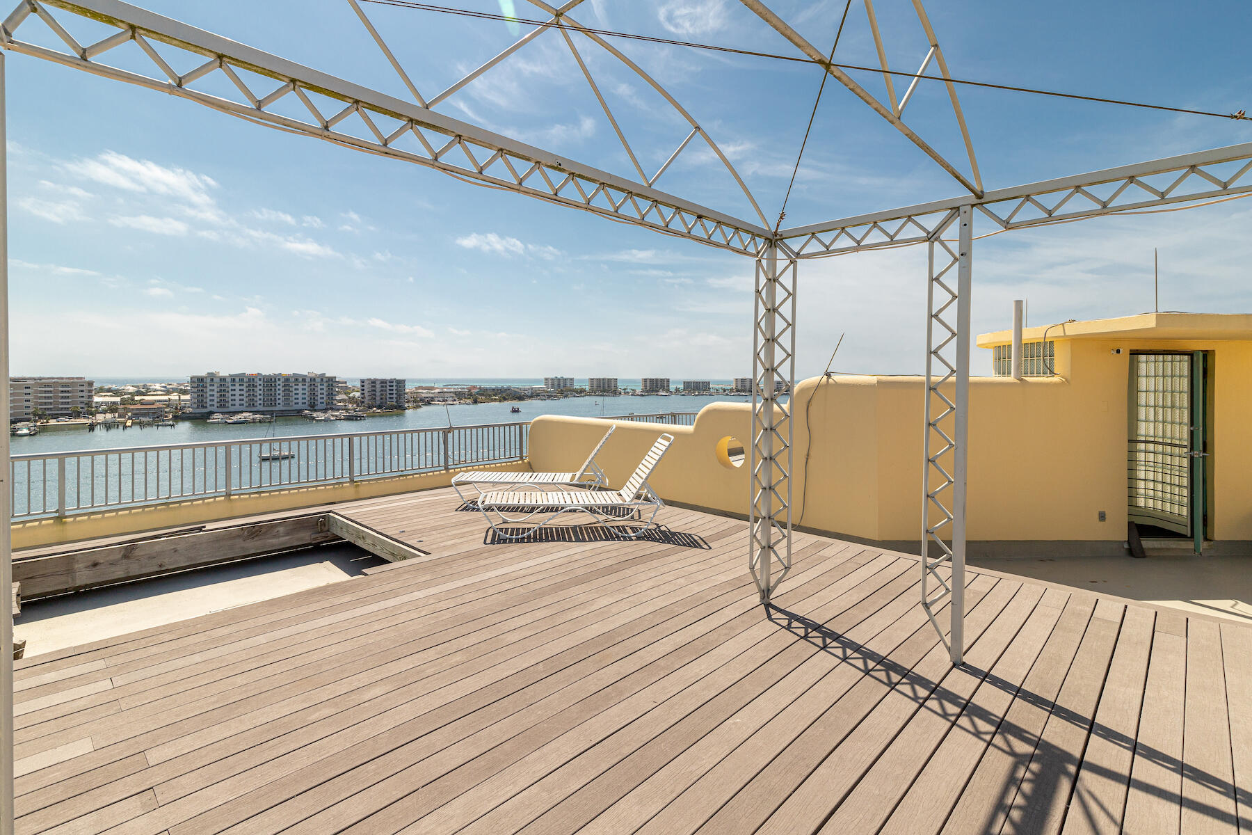 508 Harbor Boulevard, Unit 501 Destin, FL 32541 - Photo 29 of 47 a view of a balcony with wooden floor