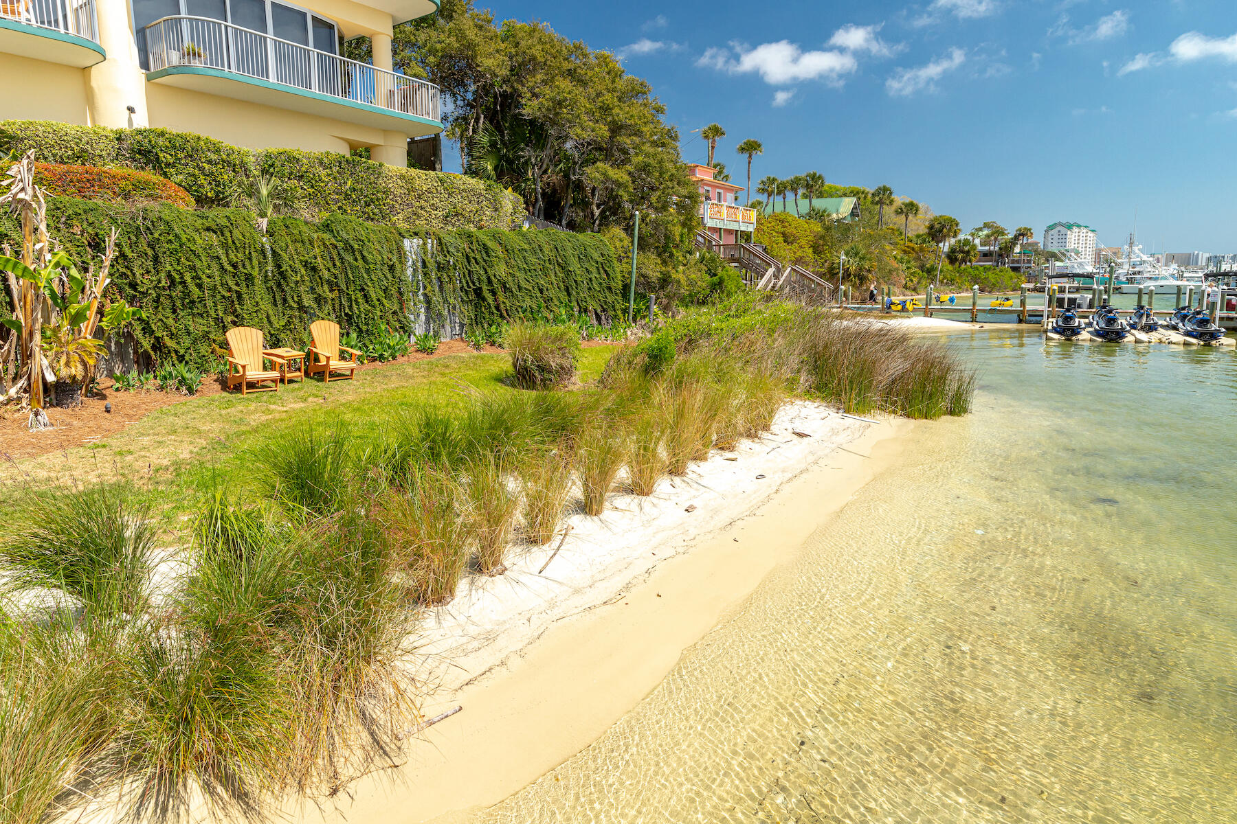 508 Harbor Boulevard, Unit 501 Destin, FL 32541 - Photo 39 of 47 a view of a lake with a building in the background