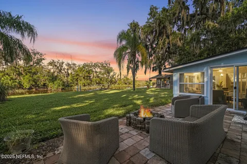a view of a couches in a garden