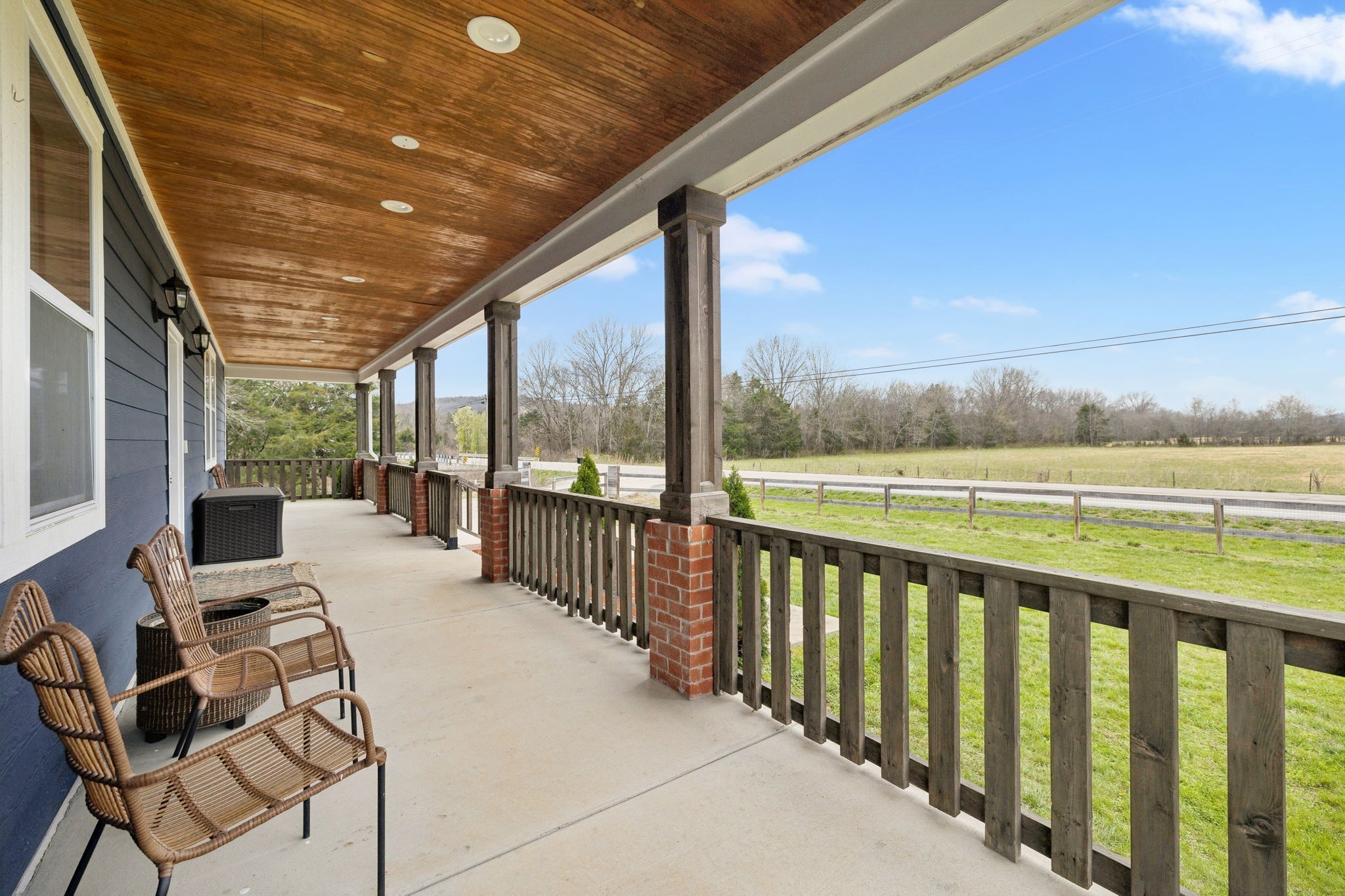 a view of balcony with furniture