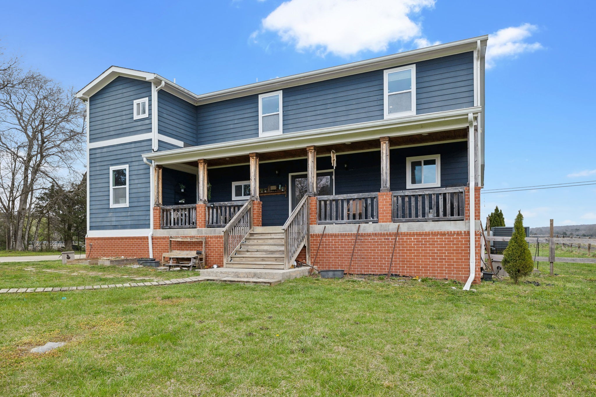 4618 Simmons Bluff Road Lebanon, TN 37090 - Photo 27 of 35 a front view of a house with a yard