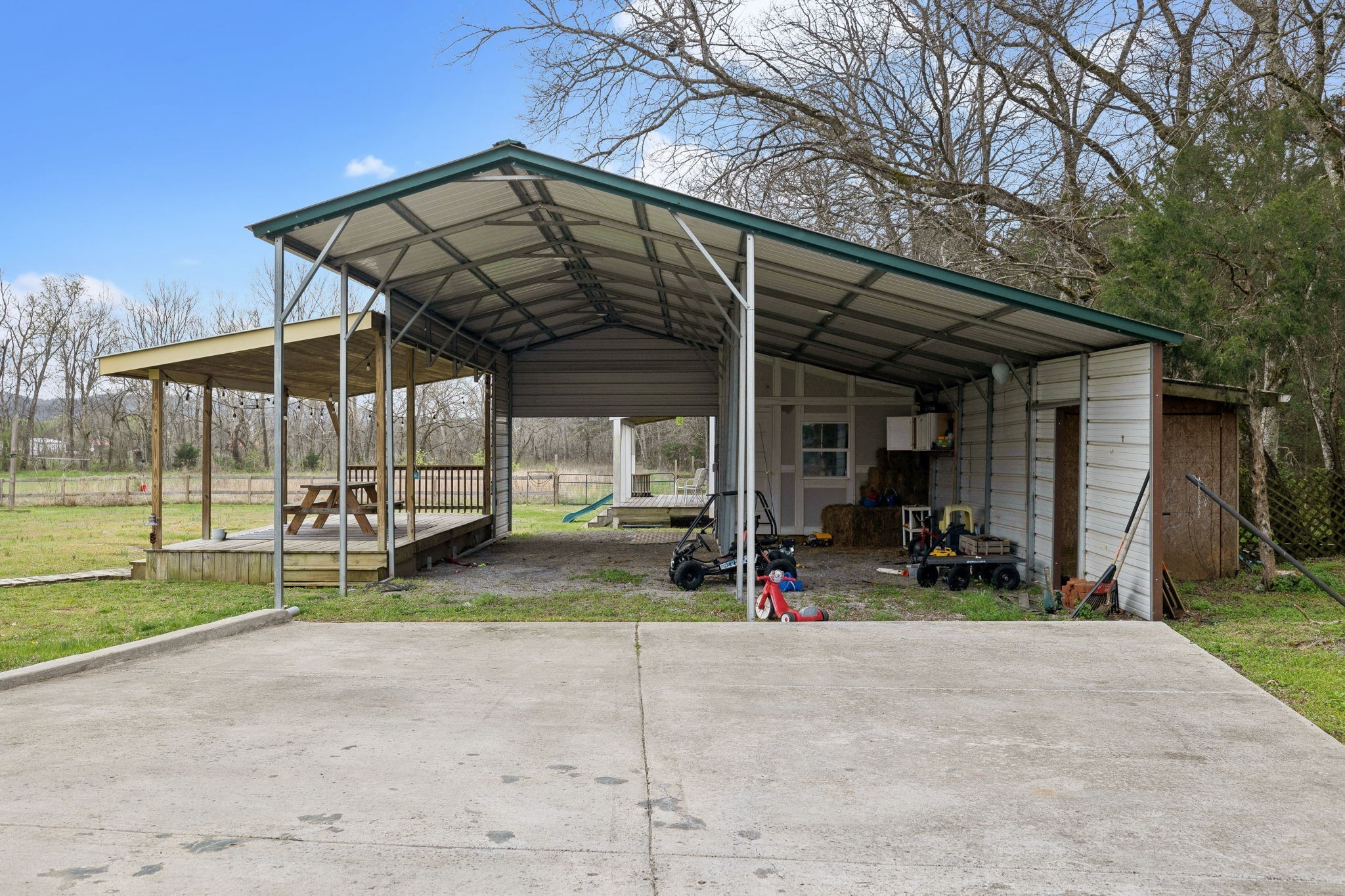 4618 Simmons Bluff Road Lebanon, TN 37090 - Photo 30 of 35 a view of a house with backyard and porch area