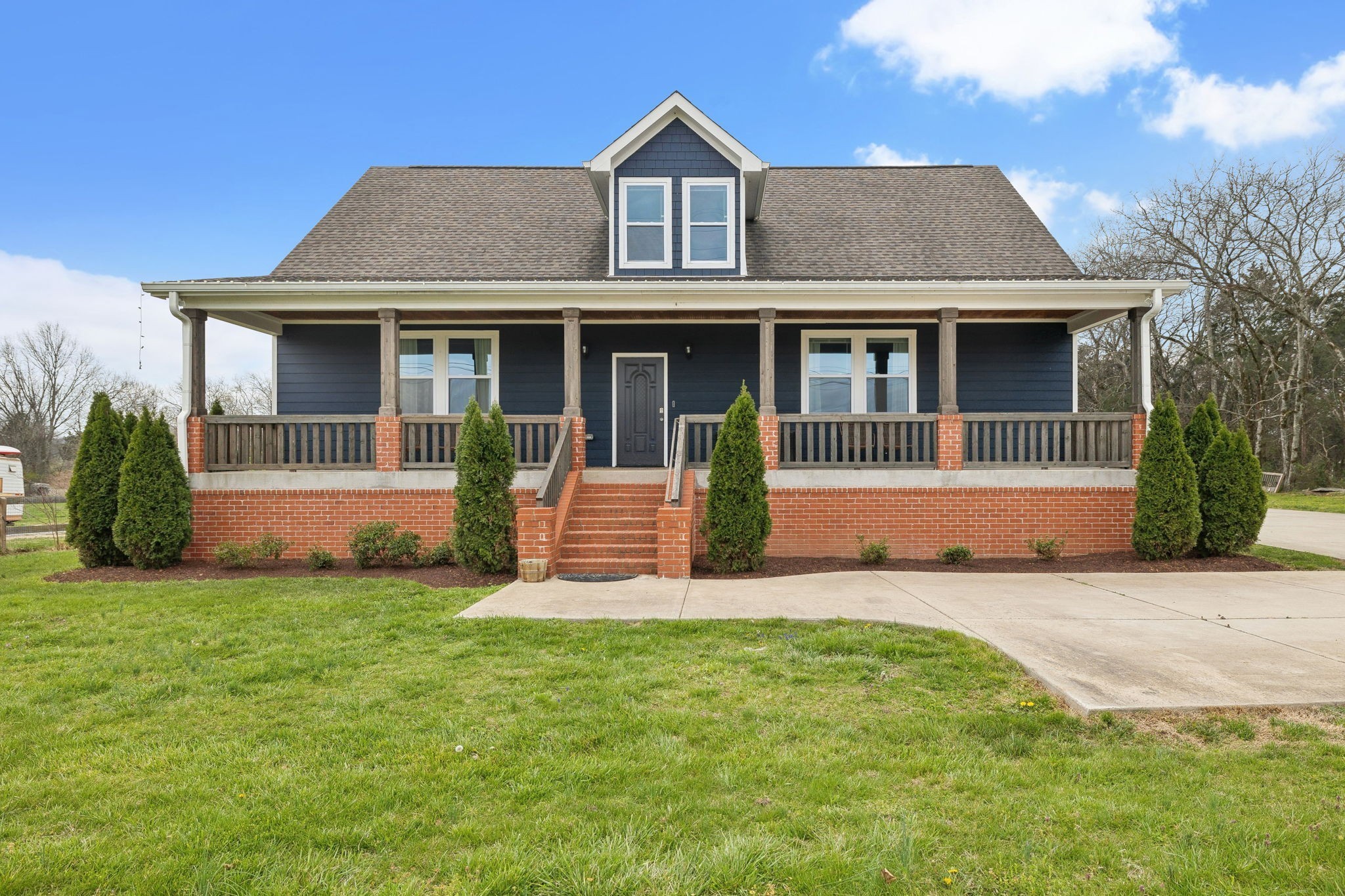 4618 Simmons Bluff Road Lebanon, TN 37090 - Photo 35 of 35 a front view of a house with a yard