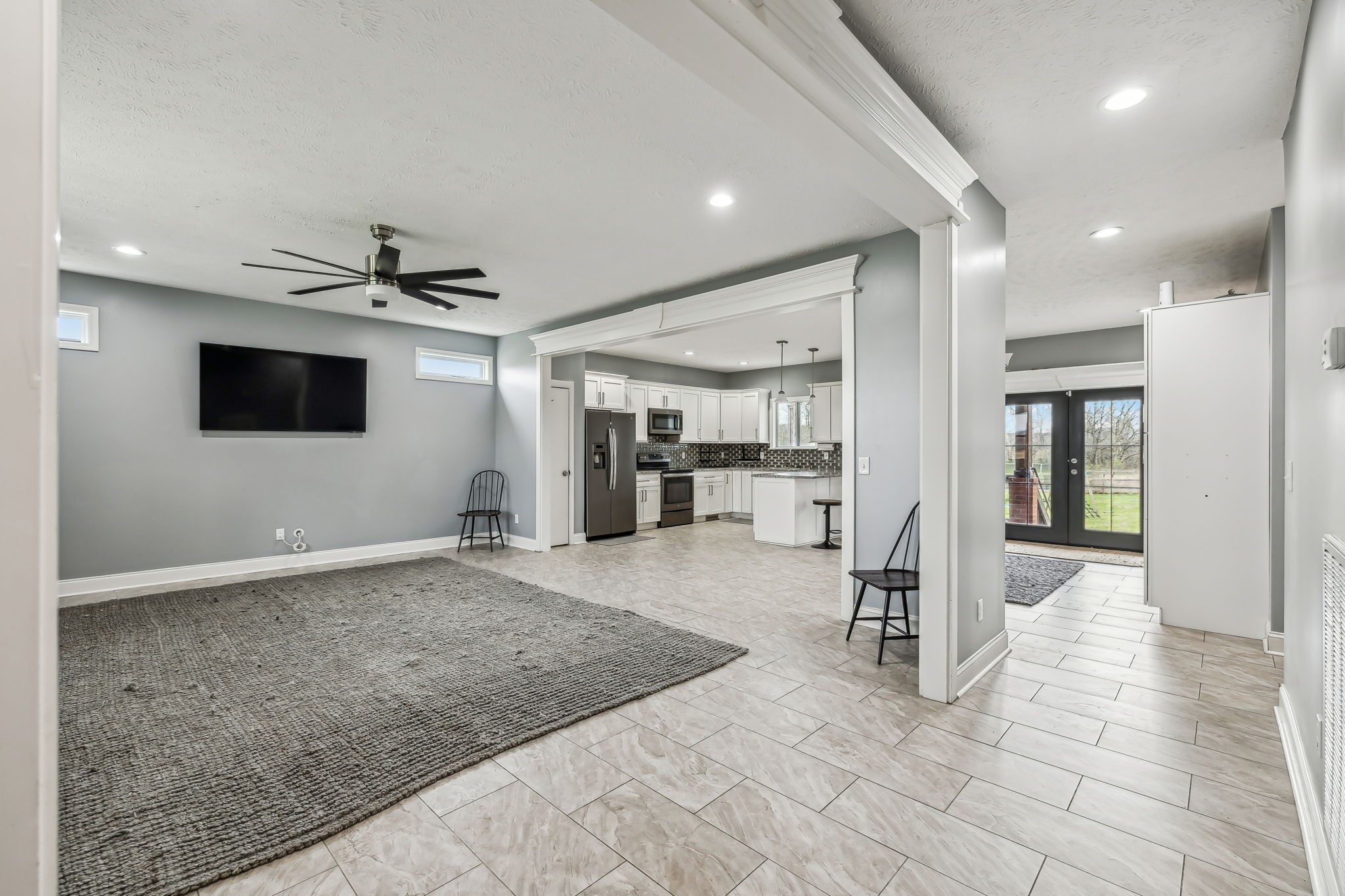 4618 Simmons Bluff Road Lebanon, TN 37090 - Photo 8 of 35 a view of a hallway with a flat screen tv