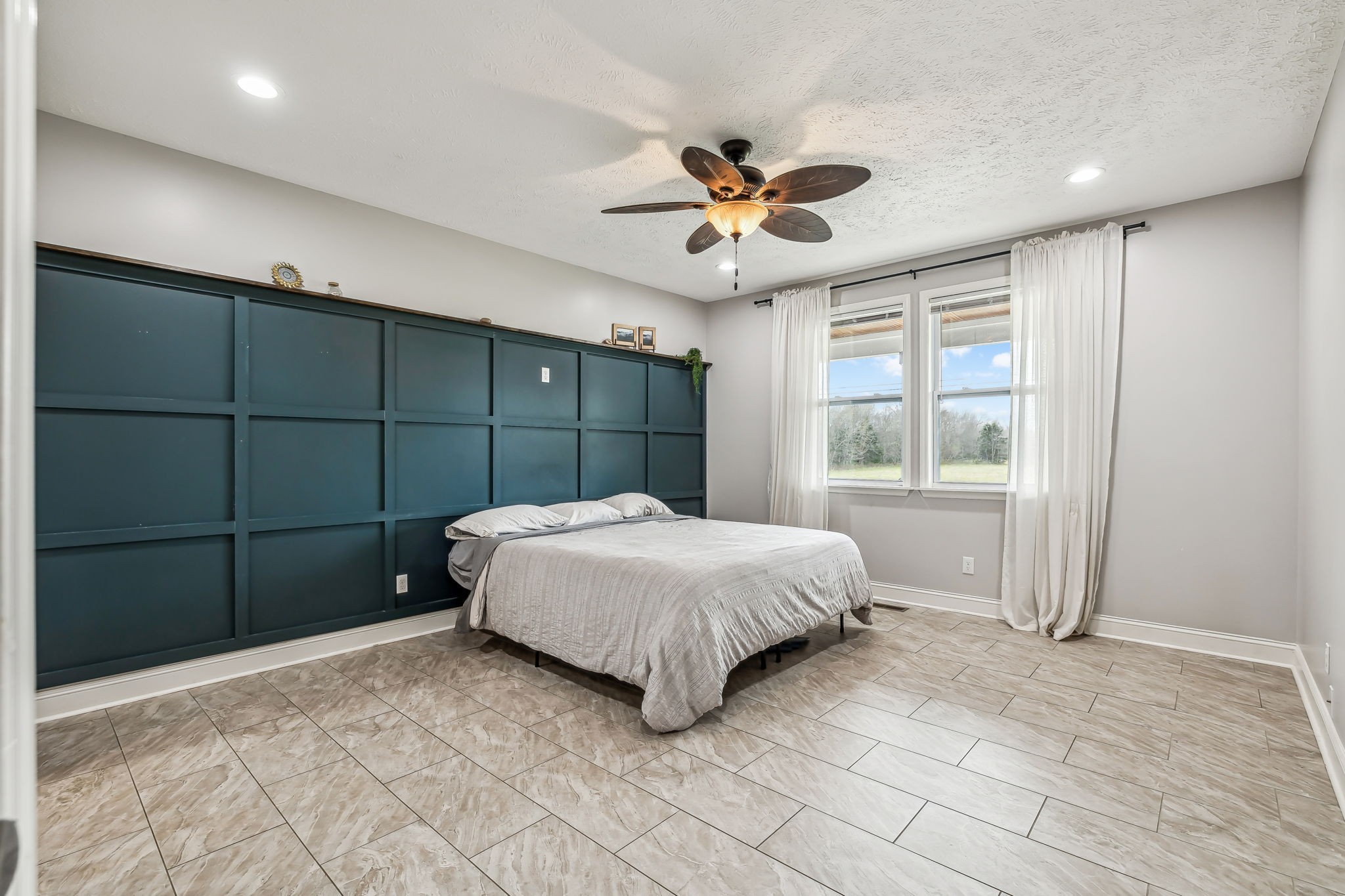 4618 Simmons Bluff Road Lebanon, TN 37090 - Photo 10 of 35 a bedroom with a large bed and a window