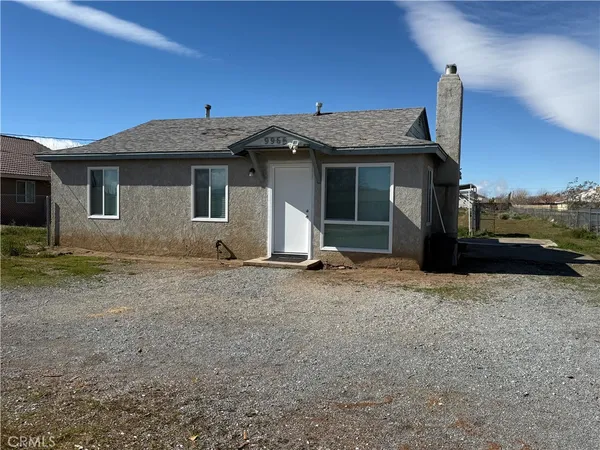 a view of a house with a patio