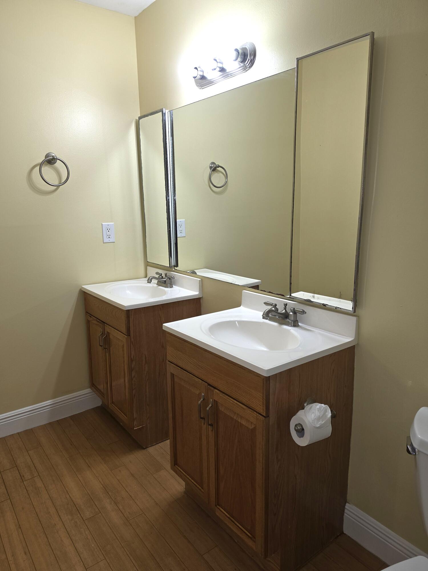 401 Springdale Circle Palm Springs, FL 33461 - Photo 21 of 31 a bathroom with a sink and a mirror
