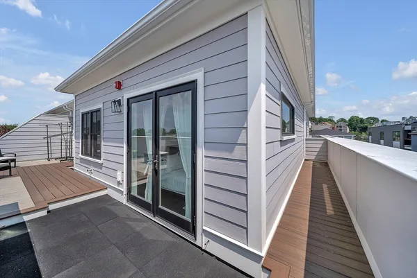 a view of a balcony with staircase
