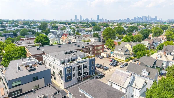 a view of a city with tall buildings