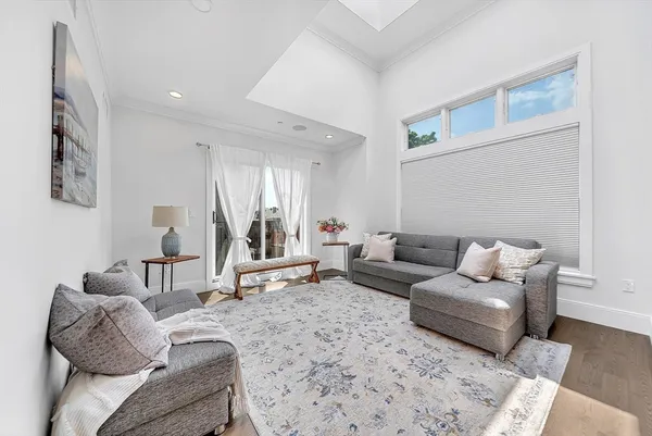 a living room with furniture and a couch