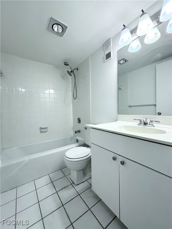 2264 Winkler Avenue, Unit 107 Fort Myers, FL 33901 - Photo 9 of 17 a bathroom with a double vanity sink toilet and shower