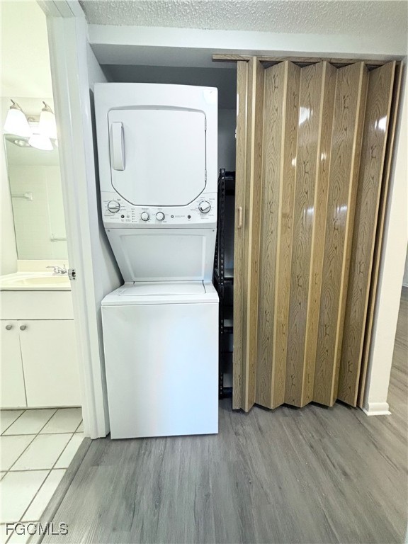 2264 Winkler Avenue, Unit 107 Fort Myers, FL 33901 - Photo 10 of 17 a utility room with dryer and washer