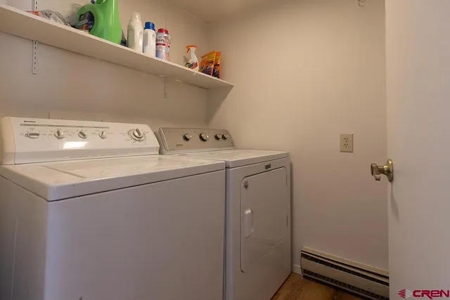 a view of a roof deck with wooden floor and fence