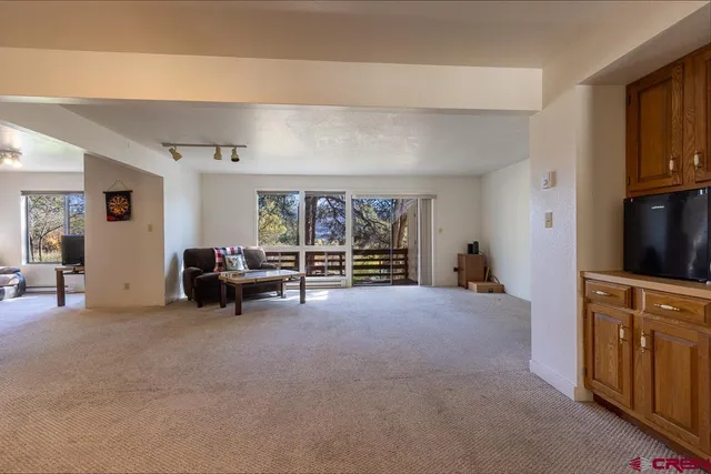 a living room with furniture and a couch