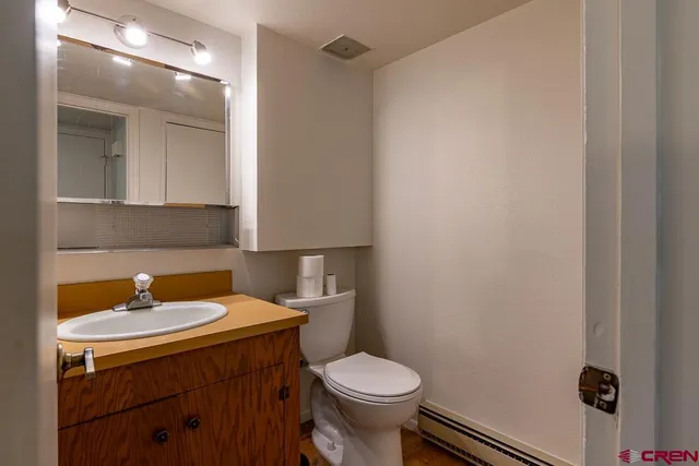 a bathroom with a sink and a toilet