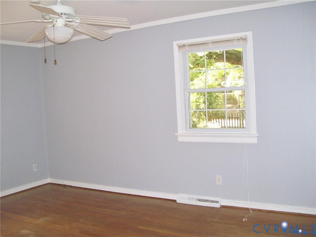 1243 Peck Road North Chesterfield, VA 23235 - Photo 15 of 19 an empty room with a window