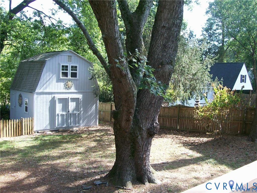 1243 Peck Road North Chesterfield, VA 23235 - Photo 18 of 19 a view of a house with a yard