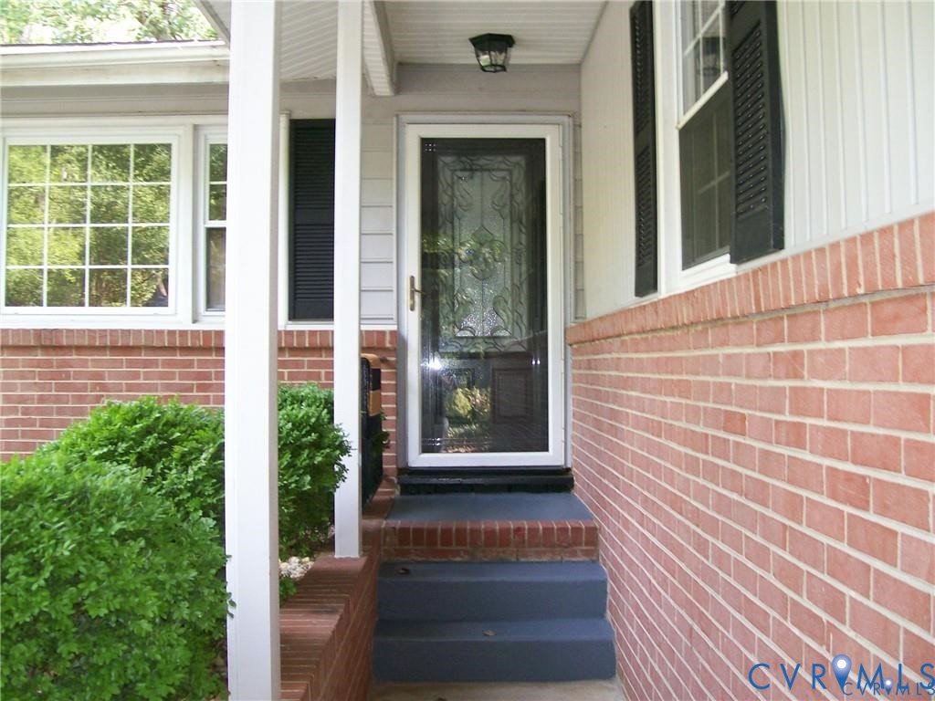 1243 Peck Road North Chesterfield, VA 23235 - Photo 6 of 19 a view of front door of house with stairs