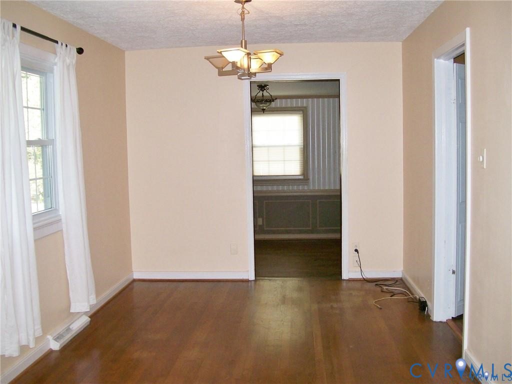 1243 Peck Road North Chesterfield, VA 23235 - Photo 8 of 19 a view of an empty room with a window