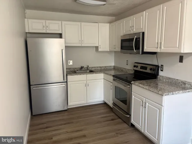 a view of swimming pool with an outdoor space and seating