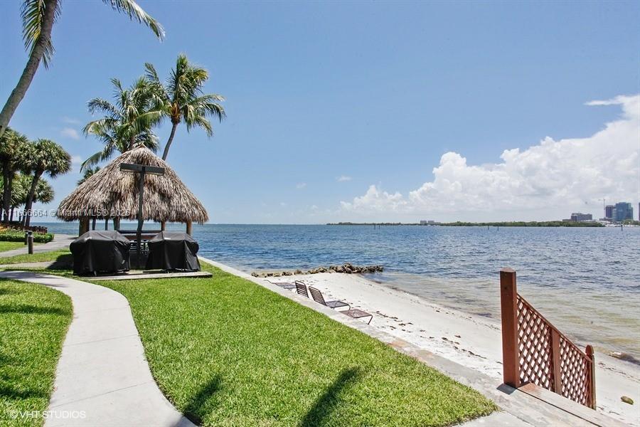 2 Grove Isle Drive, Unit B1708 Miami, FL 33133 - Photo 18 of 30 a view of a garden with sitting area