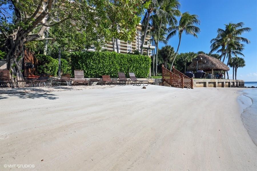 2 Grove Isle Drive, Unit B1708 Miami, FL 33133 - Photo 20 of 30 a view of a street with a building and palm tree