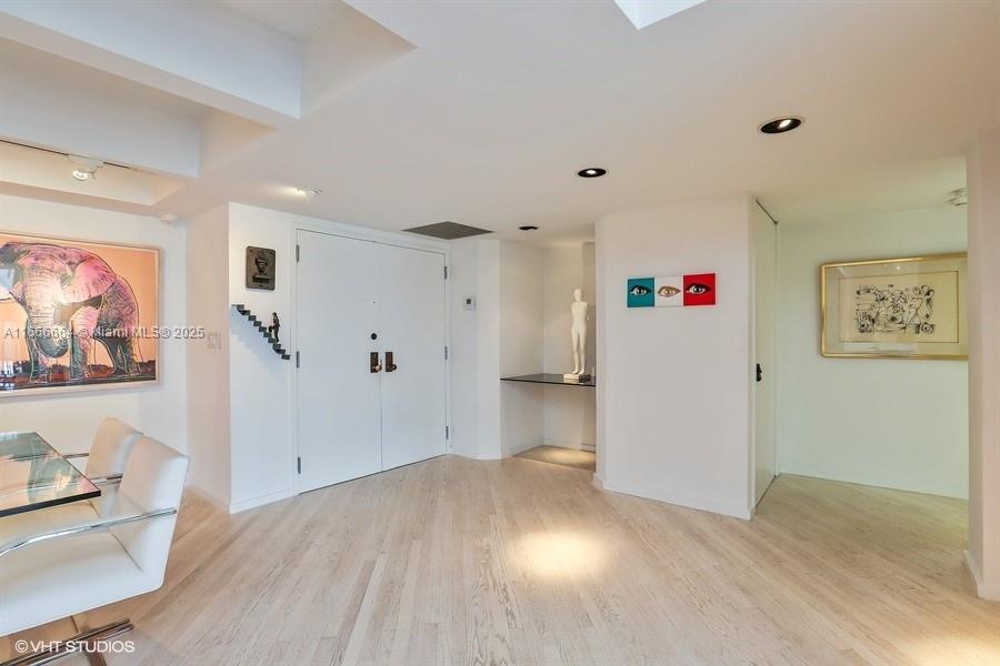 2 Grove Isle Drive, Unit B1708 Miami, FL 33133 - Photo 4 of 30 a view of a livingroom with wooden floor