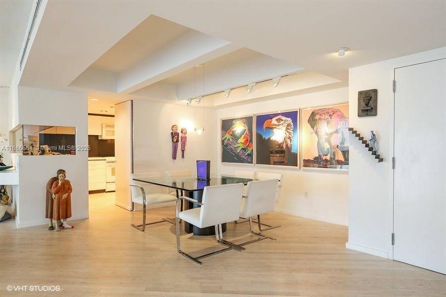 2 Grove Isle Drive, Unit B1708 Miami, FL 33133 - Photo 9 of 30 a living room with furniture and a table