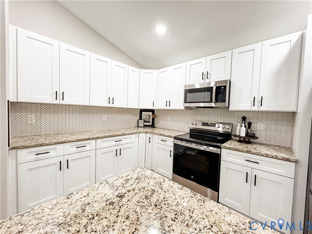 10295 Ashcake Road Ashland, VA 23005 - Photo 6 of 24 Kitchen featuring white shaker-style cabinetry, gr