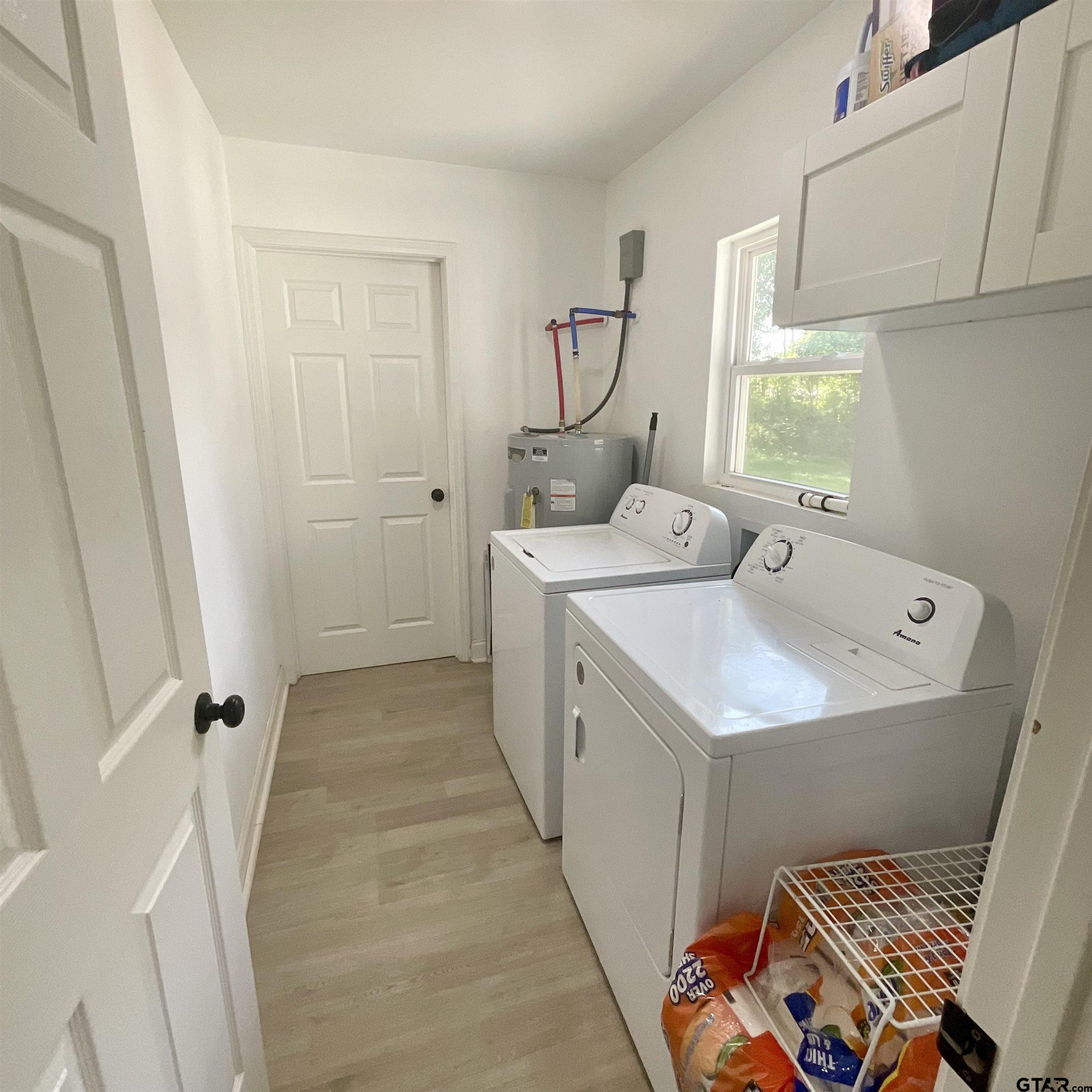 151 Patton Lane Tyler, TX 75704 - Photo 22 of 26 a bathroom with a sink and a mirror