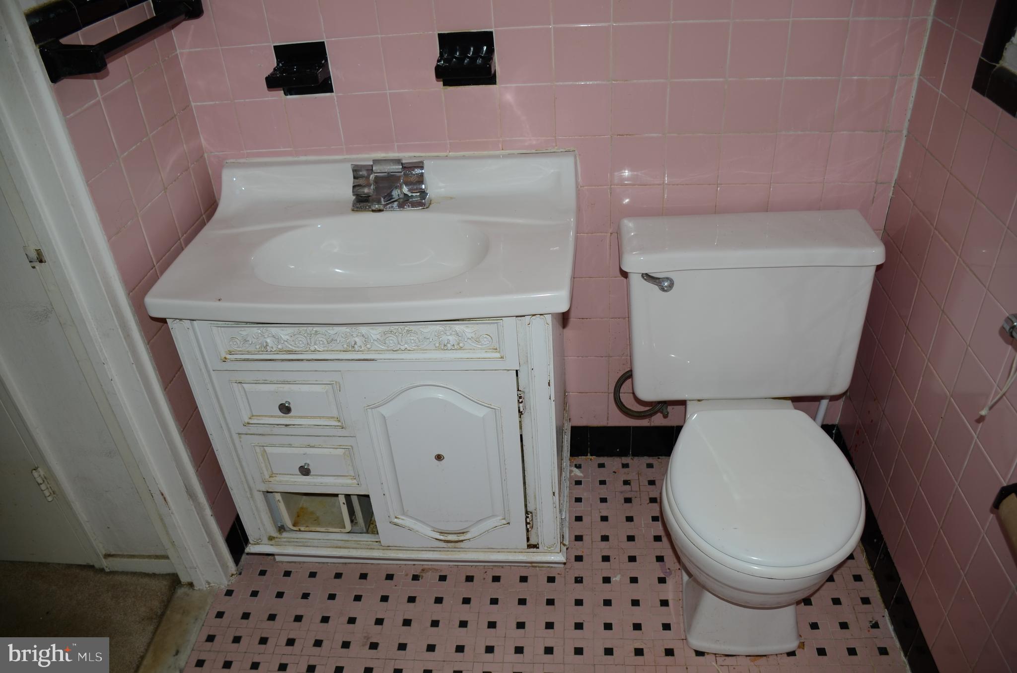 11 Homewood Road Wilmington, DE 19803 - Photo 8 of 47 a bathroom with a sink and a toilet